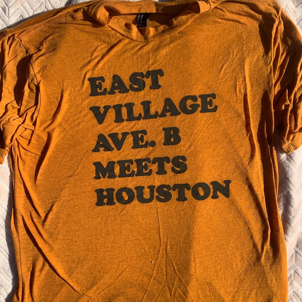 Burnt orange t shirt w/ black writing